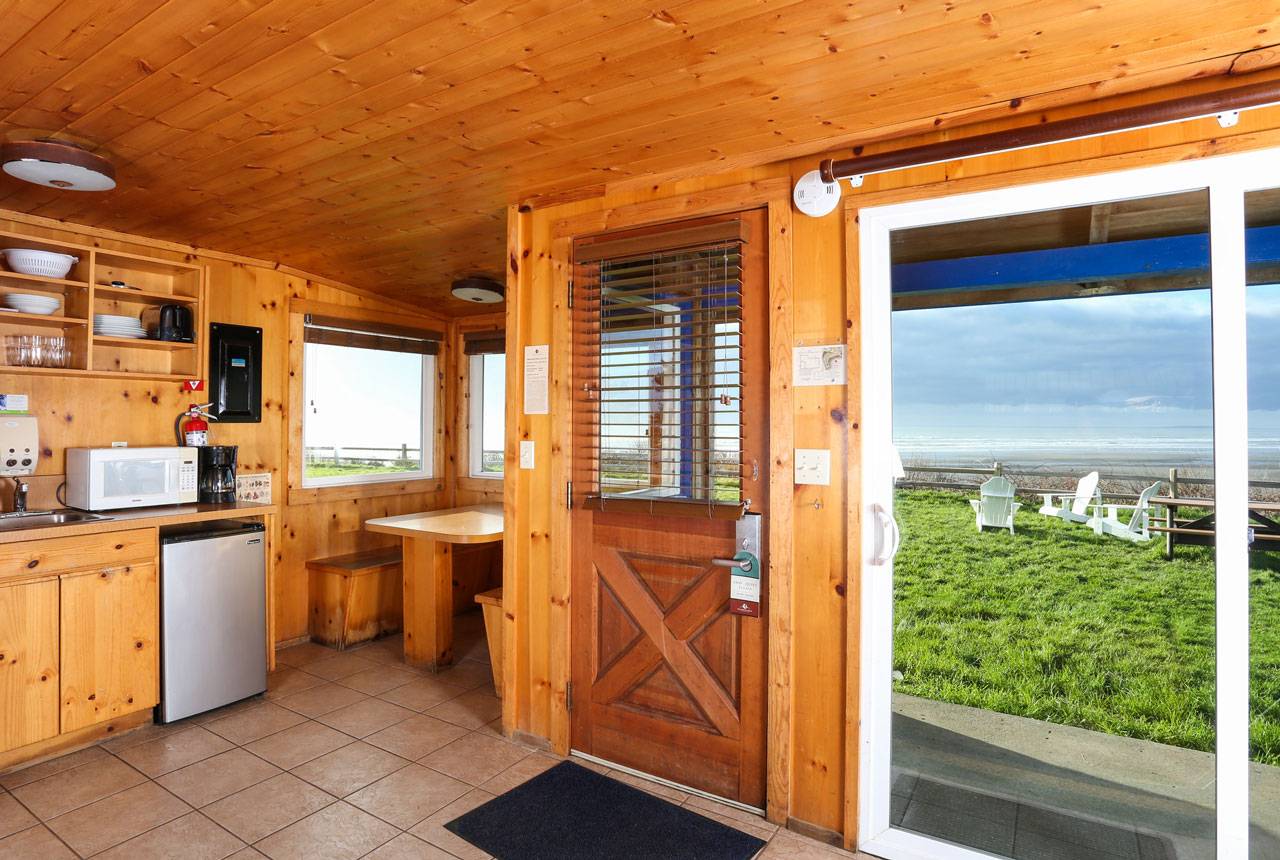 Kalaloch Lodge's gorgeous bluff cabins provide a front-row view of the ocean with kitchen/kitchenette & dining area.