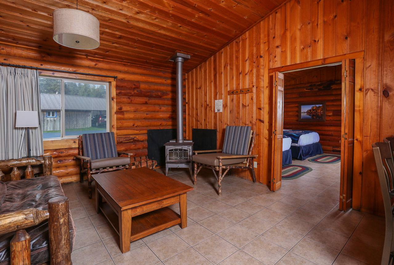 Duplex cabin at Kalaloch Lodge offers a comfortable area to relax by the wood stove, set apart from the sleeping area.