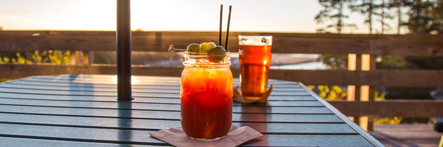 Enjoy a sip of something refreshing on the deck at Creekside Restaurant at Kalaloch Lodge.