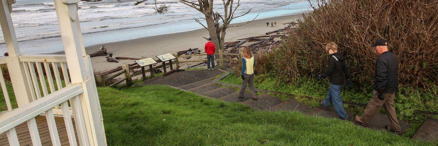Groups of people gather by the gazebo or head down to Kalaloch beach for fun and exciting events at Kalaloch Lodge.
