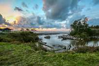 Enjoy the view from Kalaloch Lodge including Kalaloch Creek flowing out into the ocean at sunset.