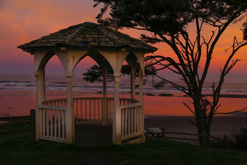 Enjoy a picture-perfect crimson sunset from the gazebo at Kalaloch Lodge.
