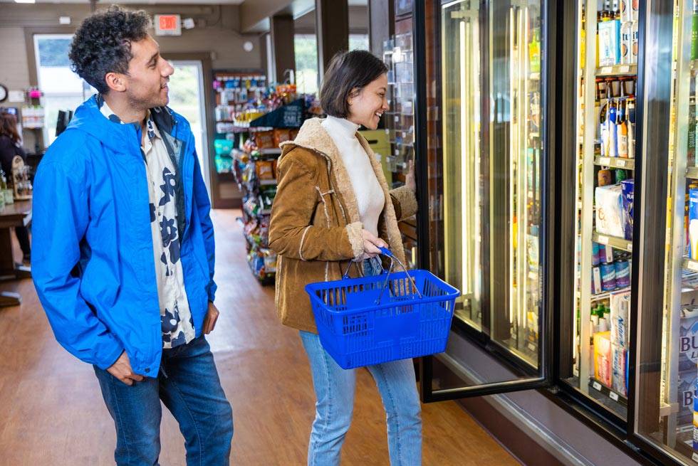 Two Kalaloch Lodge guests shopping in the Mercantile